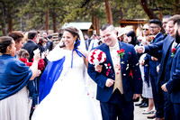 Bride and groom during petal toss and della terra wedding venue