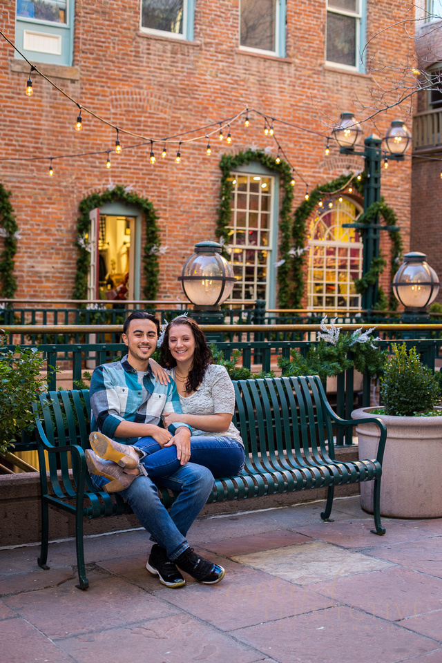 Happy couple on a bench in downtown Denver