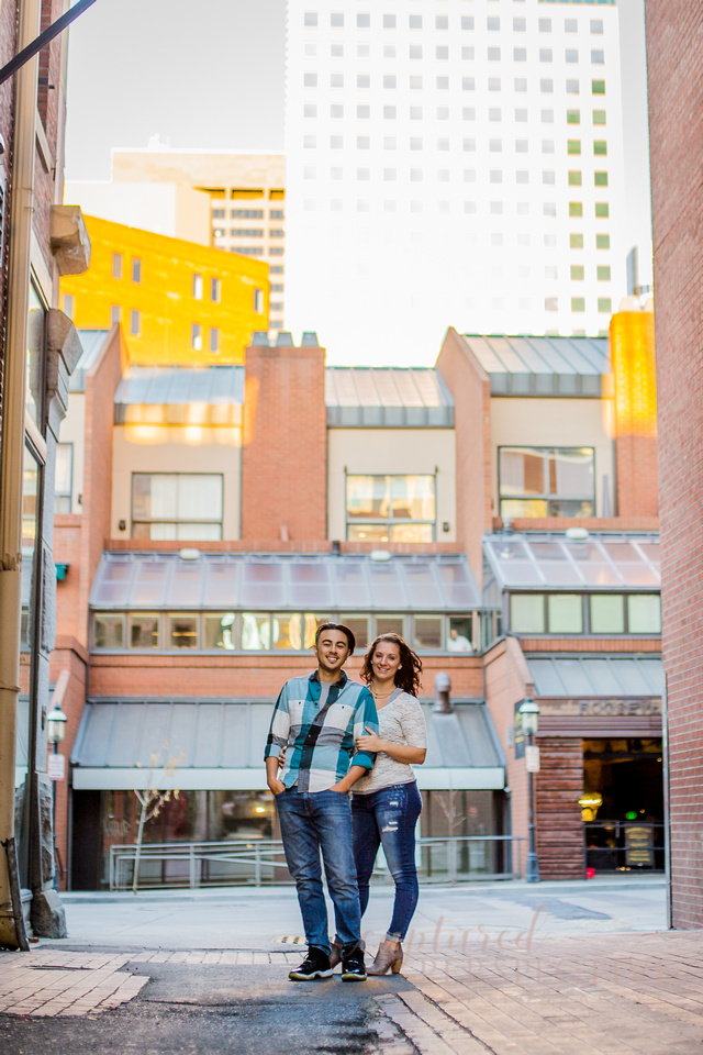 Happy couple on a bench in downtown Denver