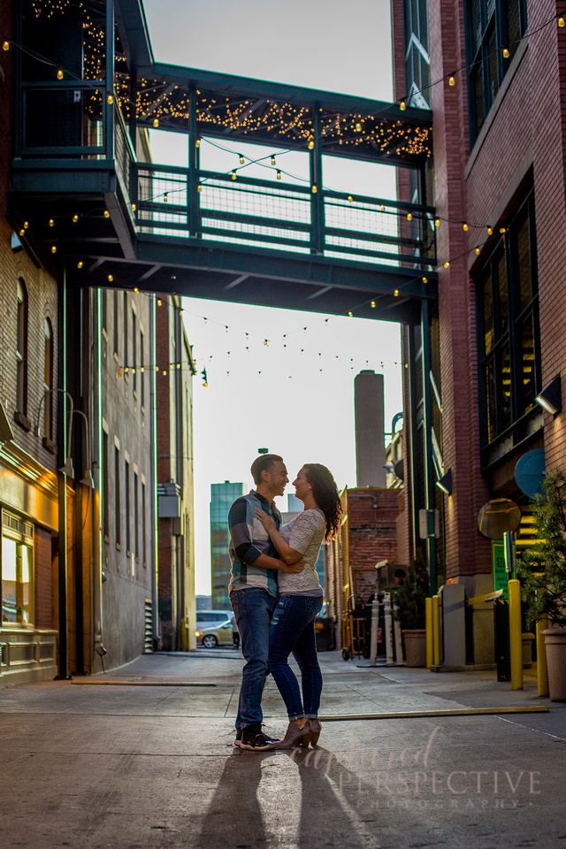 Happy couple on a bench in downtown Denver