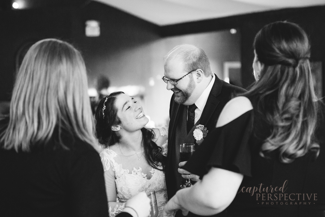 Smiling bride and groom