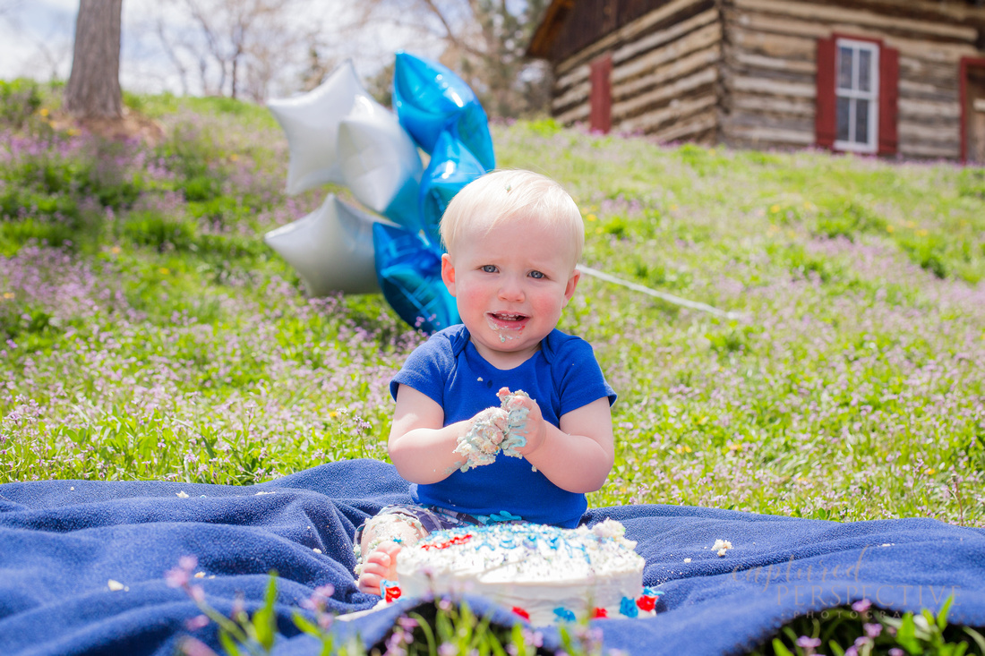 Outdoor family portraits in Golden for Hunter's 1st birthday and smash cake photos