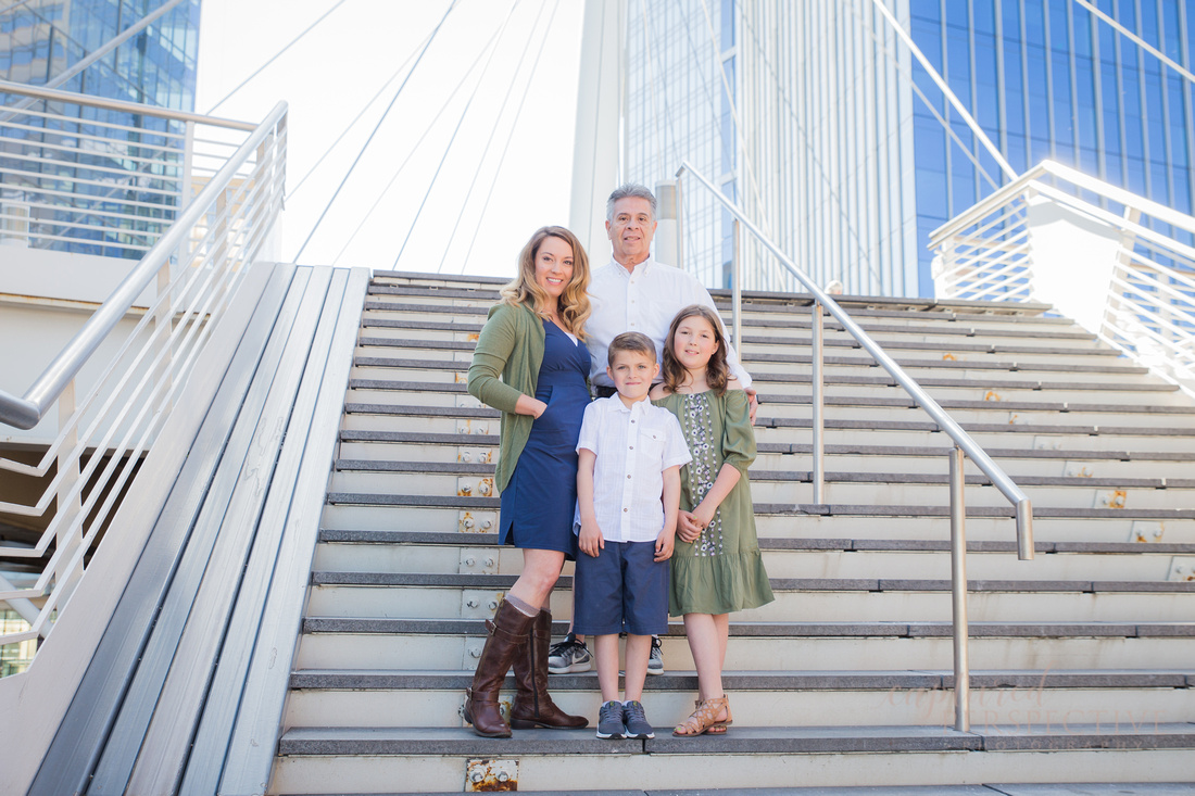 Family portrait with Grandpa at millennial bridge in Downtown Denver