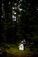 couple walking away from camera in mountains, couple in love